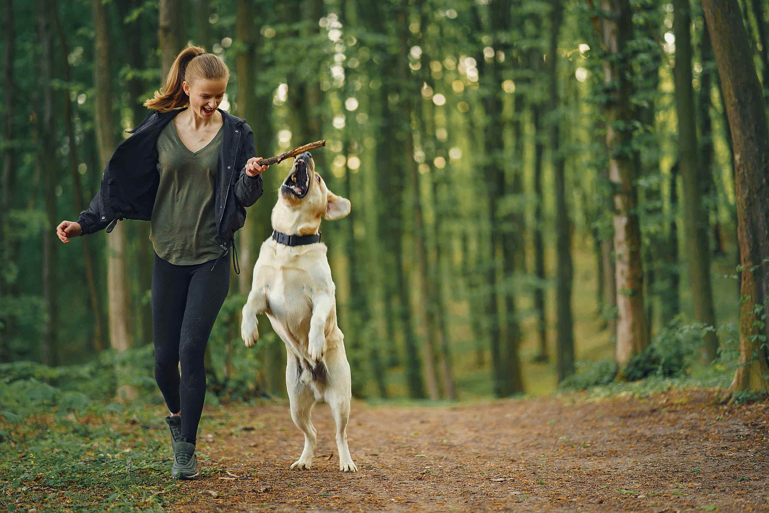 Portrait of a woman with her beautiful dog